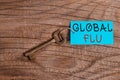 Word writing text Global Flu. Business concept for Common communicable illness spreading over the worldwide fastly Paper