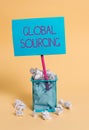 Word writing text Global Sourcing. Business concept for practice of sourcing from the global market for goods crumpled