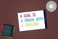 Word writing text A Goal Is A Dream With A Deadline. Business concept for Set times to your objectives Motivation Tablet Empty