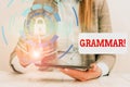 Word writing text Grammar. Business concept for whole system structure language syntax and morphology Female human wear formal Royalty Free Stock Photo