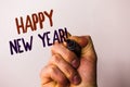 Word writing text Happy New Year Motivational Call. Business concept for Greeting Celebrating Holiday Fresh Start Man holding pen