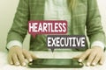 Word writing text Heartless Executive. Business concept for workmate showing a lack of empathy or compassion Business Royalty Free Stock Photo
