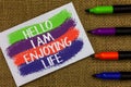Word writing text Hello I Am Enjoying Life. Business concept for Happy relaxed lifestyle Enjoy simple things Colorful waves with w
