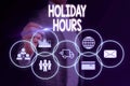 Word writing text Holiday Hours. Business concept for employee receives twice their normal pay for all hours Woman wear Royalty Free Stock Photo