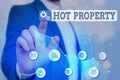 Word writing text Hot Property. Business concept for Something which is sought after or is Heavily Demanded Arrow symbol Royalty Free Stock Photo