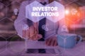 Word writing text Investor Relations. Business concept for analysisagement responsibility that integrates finance Woman