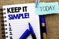 Word writing text Keep It Simple Motivational Call. Business concept for Simplify Things Easy Clear Concise Ideas written on Noteb Royalty Free Stock Photo