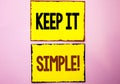 Word writing text Keep It Simple Motivational Call. Business concept for Simplify Things Easy Clear Concise Ideas written on Yello Royalty Free Stock Photo