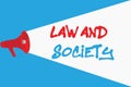 Word writing text Law And Society. Business concept for Address the mutual relationship between law and society