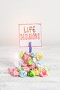 Word writing text Life Decisions. Business concept for an important decision which you make about your life Reminder pile colored