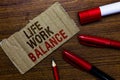Word writing text Life Work Balance. Business concept for stability person needs between his job and personal time Pen pencil cap Royalty Free Stock Photo