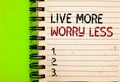 Word writing text Live More Worry Less. Business concept for Have a good attitude motivation be careless enjoy life Written black Royalty Free Stock Photo