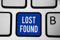Word writing text Lost Found. Business concept for Things that are left behind and may retrieve to the owner Keyboard blue key Int