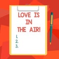 Word writing text Love Is In The Air. Business concept for Roanalysistic emotions situations new couple relationships