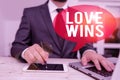 Word writing text Love Wins. Business concept for used to celebrate or commemorate the victory of marriage equality Male