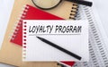 Word writing text Loyalty Program. Business concept on the table chart