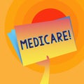 Word writing text Medicare. Business concept for Federal health insurance for showing above 65 or with disabilities Hand