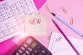 Word writing text New Project. Business concept for Planned set of interrelated tasks to be executed over a time Note paper stick