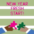 Word writing text New Year Fresh Start. Business concept for Time to follow resolutions reach out dream job Two Hands