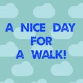 Word writing text A Nice Day For A Walk. Business concept for Good weather to go outside leisure free relaxing time Blue Royalty Free Stock Photo