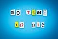 A word writing text - no time to die. Cartoon colorful letters on a blue background. Headline, banner with inscription font. Royalty Free Stock Photo