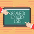 Word writing text Organized Keyword Lists. Business concept for Taking list of keywords and place them in groups Hu analysis Hands Royalty Free Stock Photo