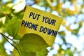 Word writing text Put Your Phone Down. Business concept for end telephone connection saying goodbye caller Piece of Royalty Free Stock Photo