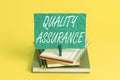 Word writing text Quality Assurance. Business concept for preventing mistakes and defects in analysisufactured products Book