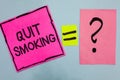 Word writing text Quit Smoking. Business concept for Discontinuing or stopping the use of tobacco addiction Pink paper notes remin