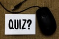 Word writing text Quiz Question. Business concept for Short Tests Evaluation Examination to quantify your knowledge USB cable mous Royalty Free Stock Photo