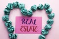 Word writing text Real Estate. Business concept for Residential Property Building Covered Land Chattels Real written on Pink Stick Royalty Free Stock Photo