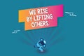 Word writing text We Rise By Lifting Others.. Business concept for Team Spirit we feel Abundant with possibility Royalty Free Stock Photo