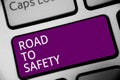 Word writing text Road To Safety. Business concept for Secure travel protect yourself and others Warning Caution Keyboard purple k Royalty Free Stock Photo