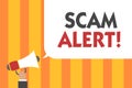 Word writing text Scam Alert. Business concept for warning someone about scheme or fraud notice any unusual Man holding megaphone