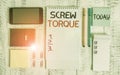 Word writing text Screw Torque. Business concept for measure of the twisting force required to spin the nut Smartphone wallet