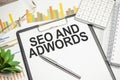 Word writing text Seo And Adwords. Business concept for they are main tools components of Search Engine Marketing