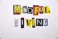 A word writing text showing concept of MINDFUL LIVING made of different magazine newspaper letter for Business case on the white b Royalty Free Stock Photo