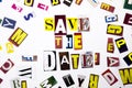 A word writing text showing concept of Save The Date made of different magazine newspaper letter for Business case on the white ba Royalty Free Stock Photo