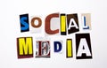 A word writing text showing concept of Social Media made of different magazine newspaper letter for Business case on the white bac