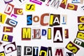 A word writing text showing concept of Social Media made of different magazine newspaper letter for Business case on the white bac