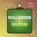 Word writing text Small Business Solutions. Business concept for a Company to solve Specific Trade problems Clipboard
