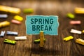 Word writing text Spring Break. Business concept for Vacation period at school and universities during spring Clothespin holding b Royalty Free Stock Photo