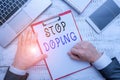 Word writing text Stop Doping. Business concept for do not use use banned athletic perforanalysisce enhancing drugs Hand Royalty Free Stock Photo