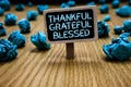 Word writing text Thankful Grateful Blessed. Business concept for Appreciation gratitude good mood attitude Paperclip hold black p Royalty Free Stock Photo