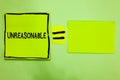 Word writing text Unreasonable. Business concept for Beyond the limits of acceptability or fairness Inappropriate Green paper note