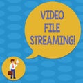 Word writing text Video File Streaming. Business concept for video be viewed online without being downloaded Man in