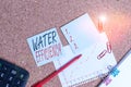 Word writing text Water Efficiency. Business concept for reduce water wastage by measuring amount of water required Desk notebook Royalty Free Stock Photo