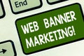 Word writing text Web Banner Marketing. Business concept for entails to embed an advertisement in a web page Keyboard