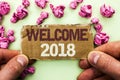 Word writing text Welcome 2018. Business concept for Celebration New Celebrate Future Wishes Gratifying Wish written on Tear Cardb
