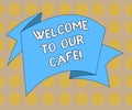 Word writing text Welcome To Our Cafe. Business concept for Greeting receiving showing in restaurant good attention Royalty Free Stock Photo